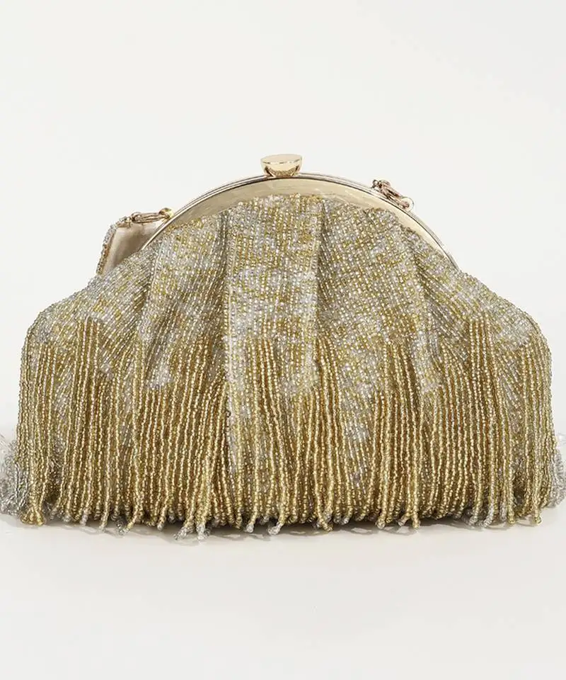Gold suede clutch with detachable chain
