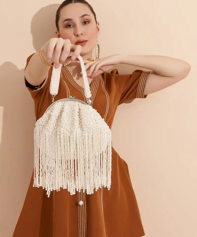 White suede embellished clutch