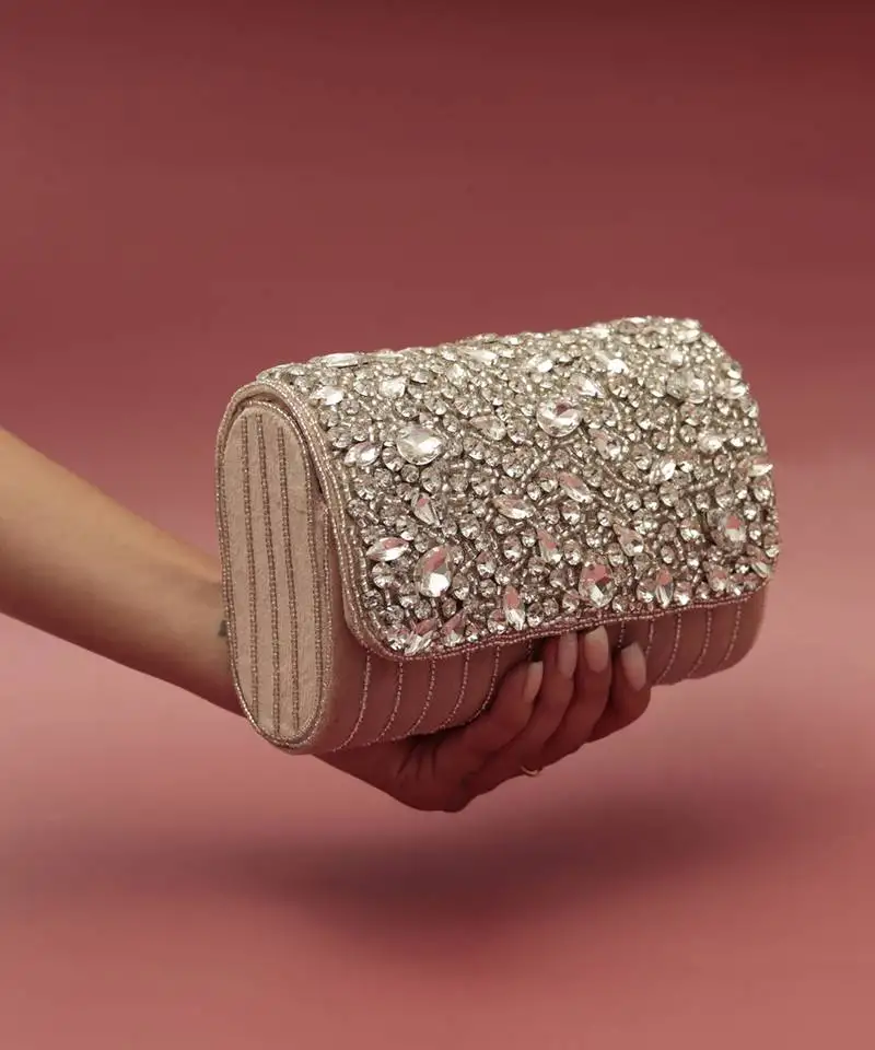 Beige suede embellished clutch bag