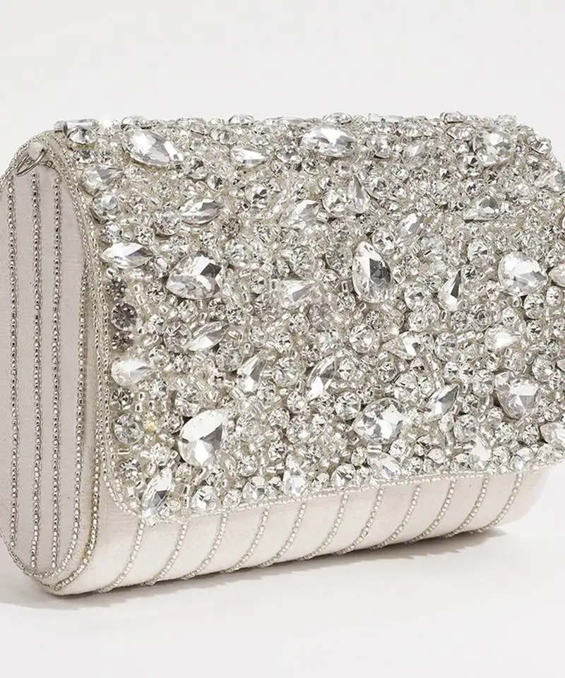 White suede embellished clutch bag