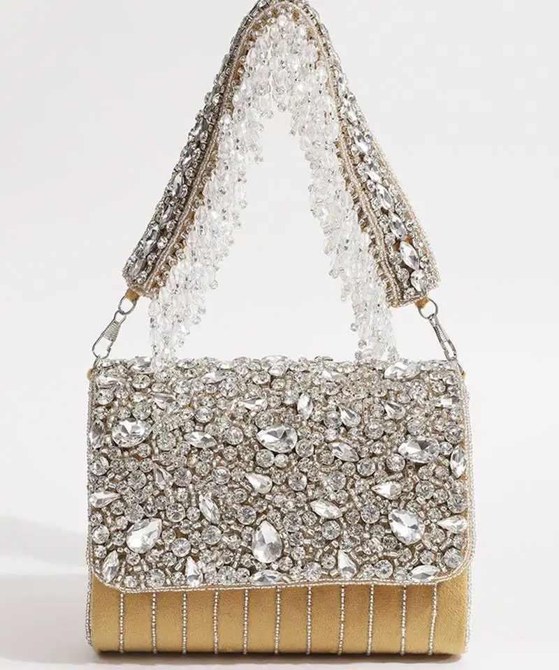 Gold suede embellished clutch bag