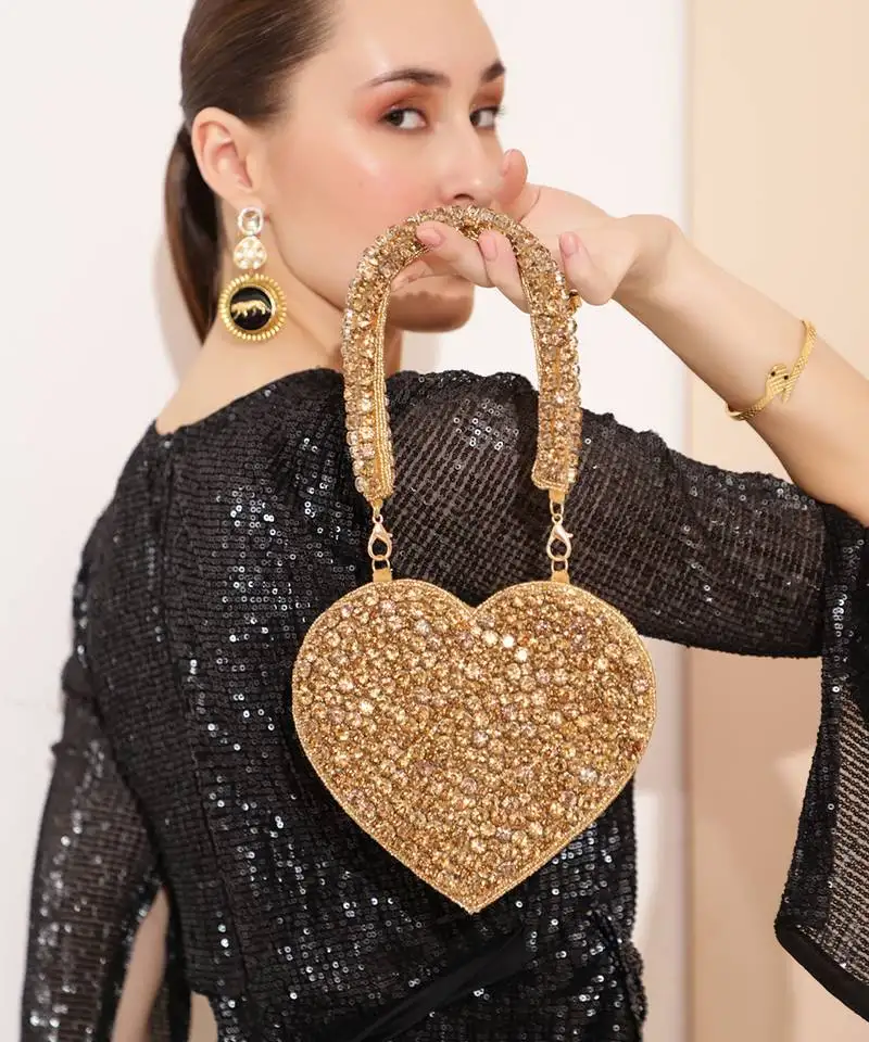 Gold suede mini heart bag