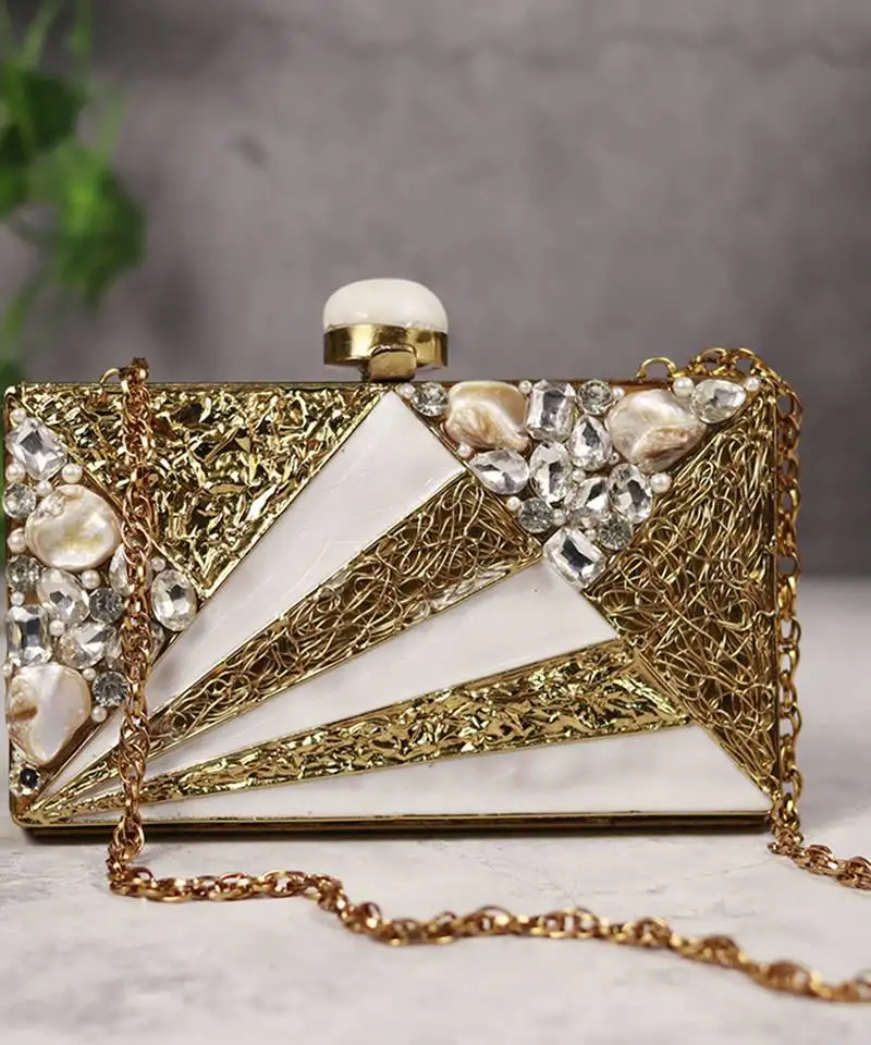 Gold bead embellished mother of pearl clutch