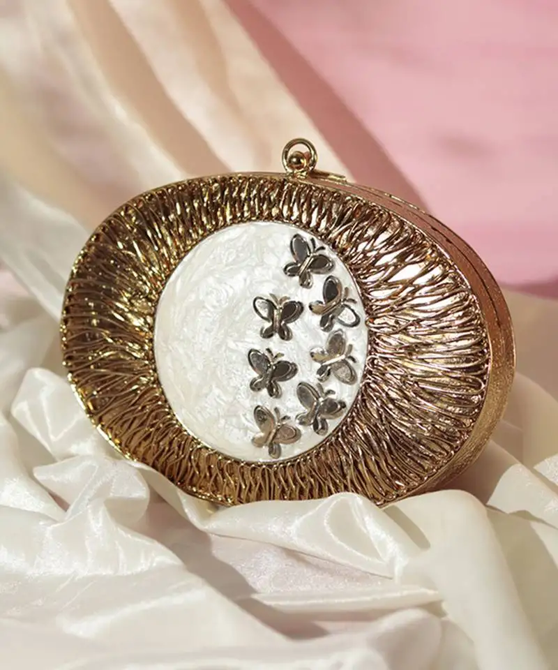 Gold hand crafted clutch with detachable chain