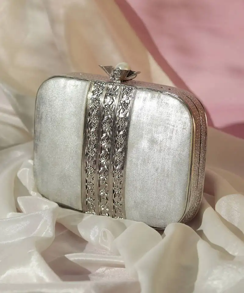 Silver intricate brass wirework clutch