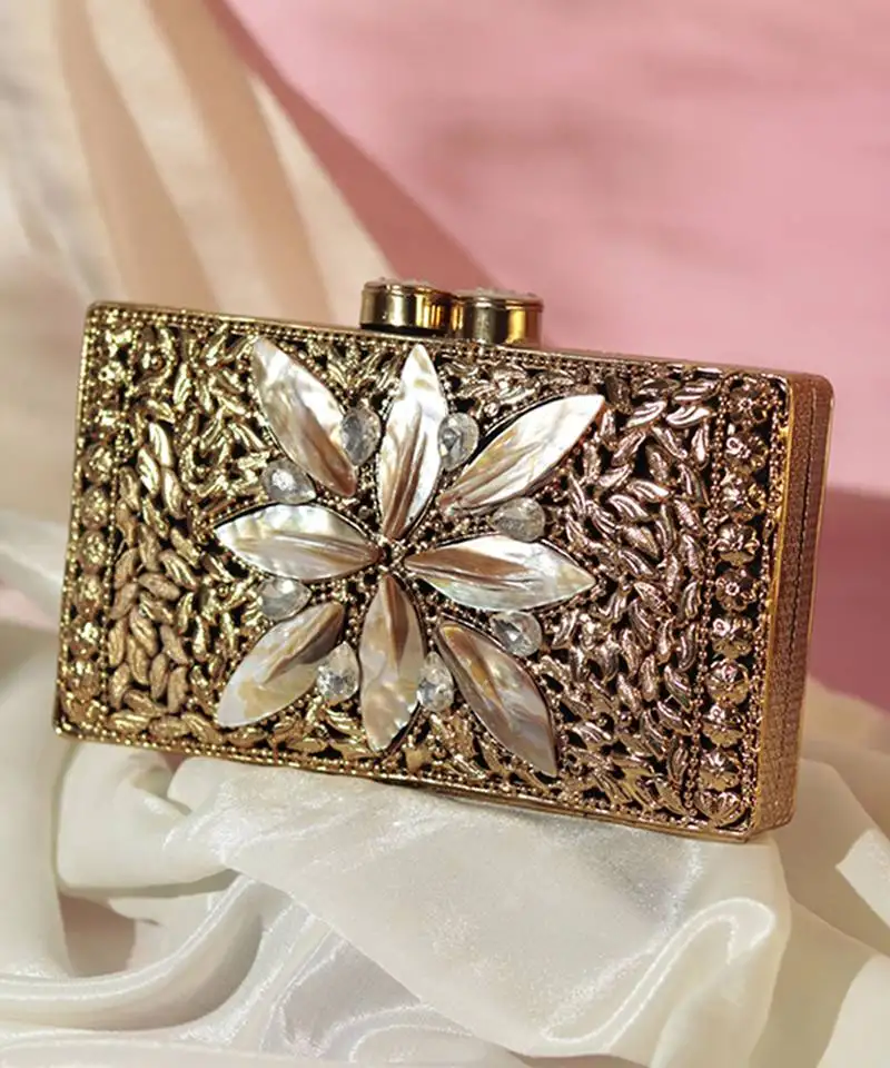 Embellished mother of pearl gold clutch