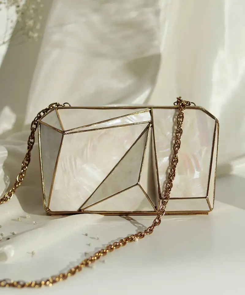 Gold handcrafted clutch with removeable chain