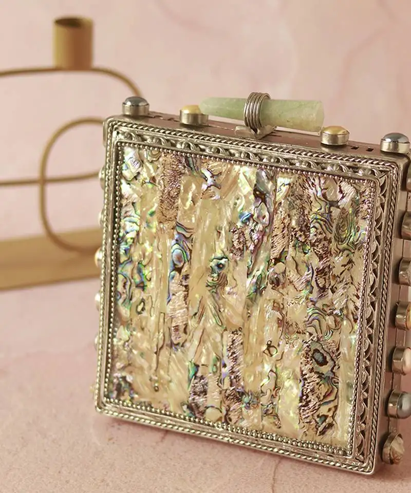 Mother of pearl gold clutch