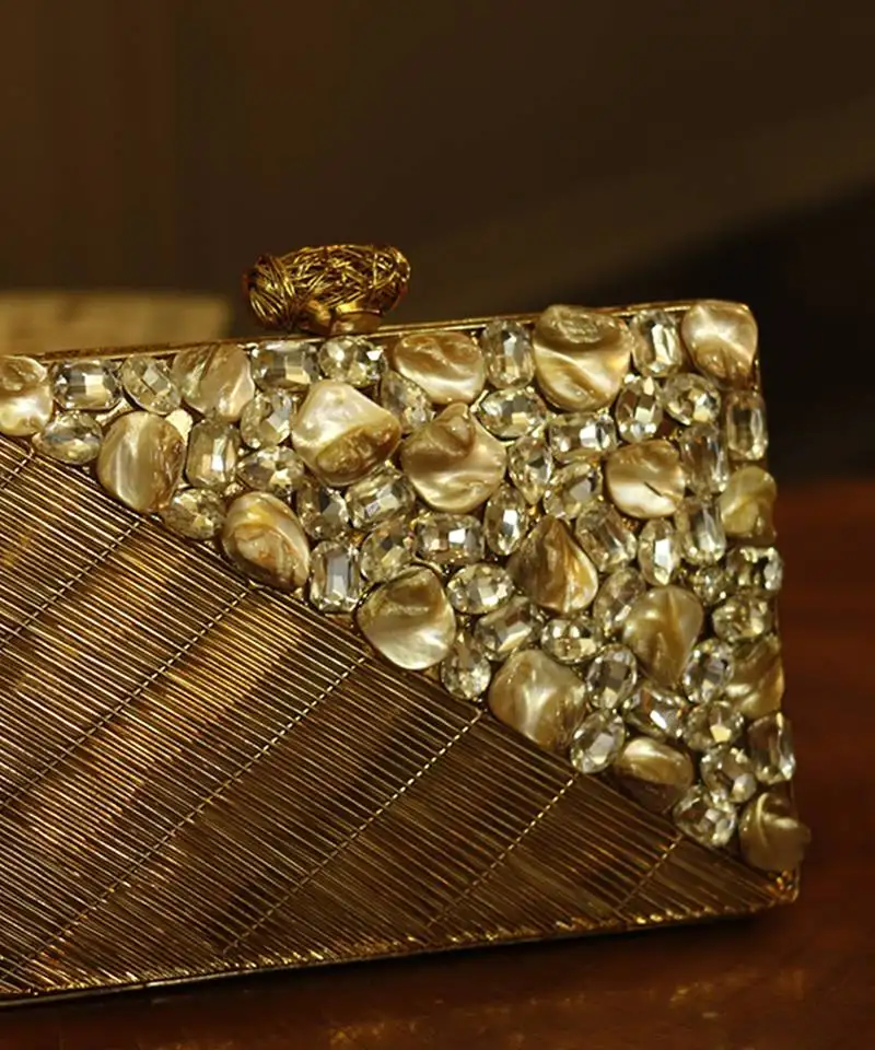 Gold beaded golden embellished brass clutch