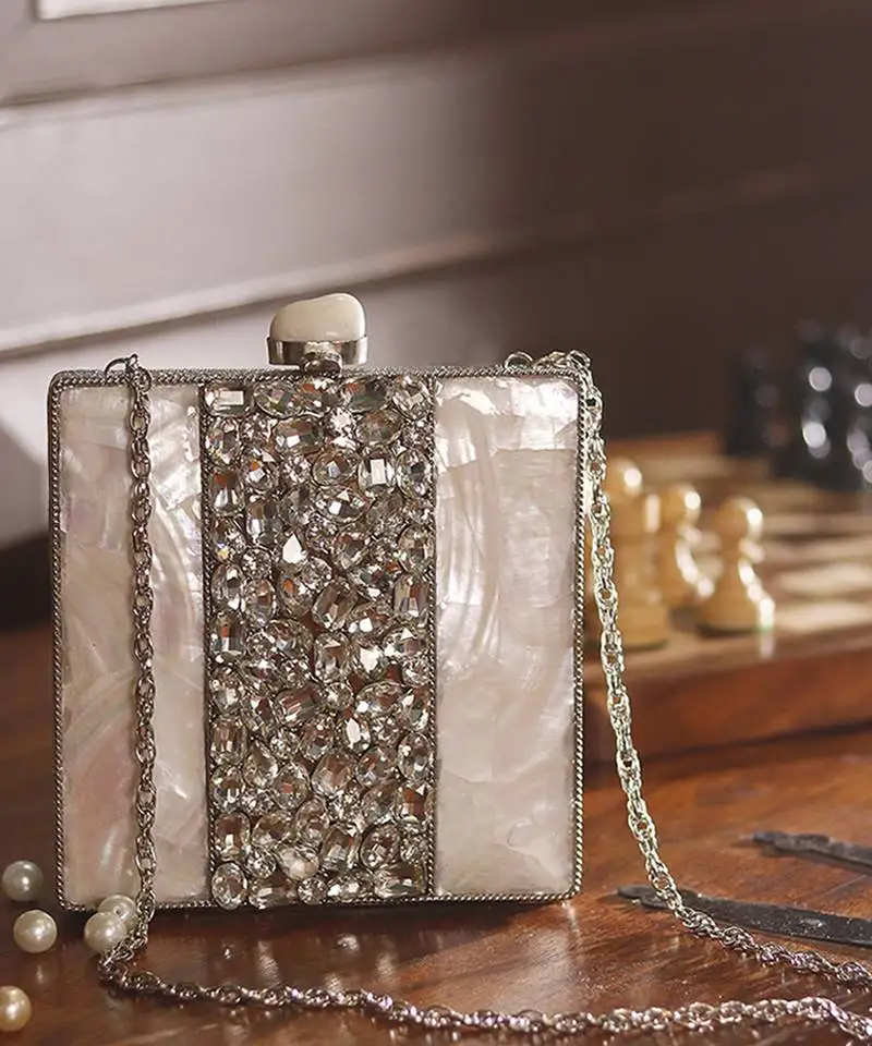 Silver beaded clutch with detachable chain