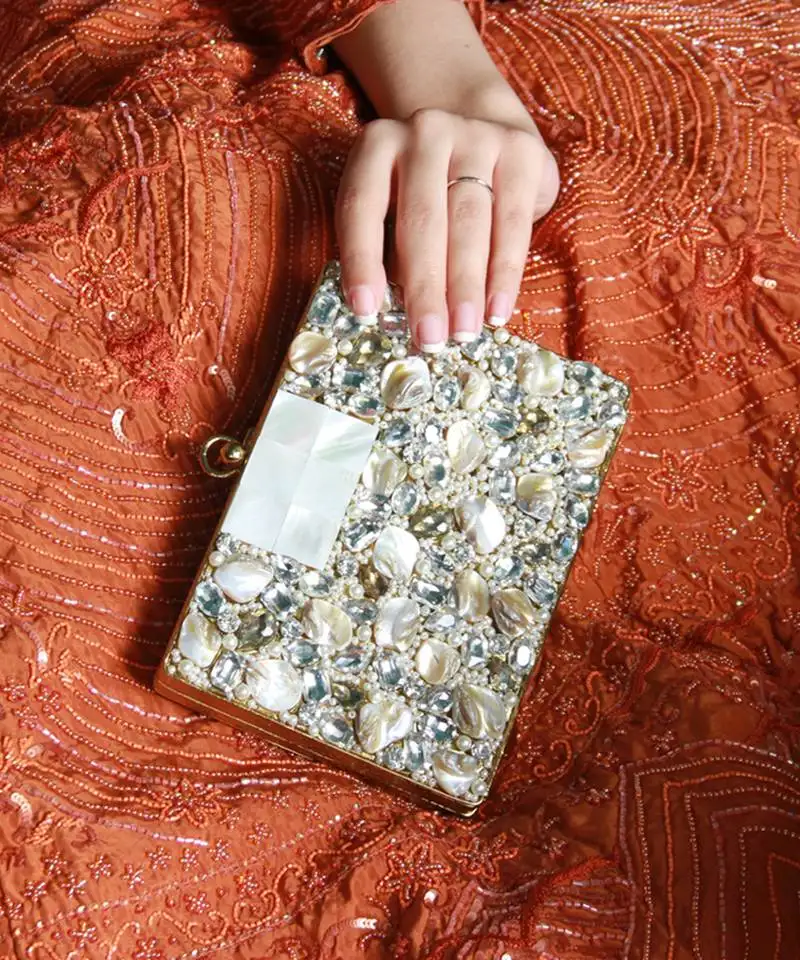 Gold brass clutch with bead work