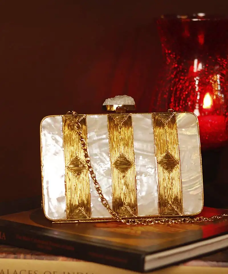Gold clutch with detachable chain strap