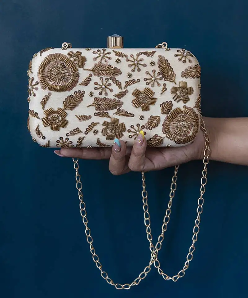 Beige silk beige hand embroidered clutch