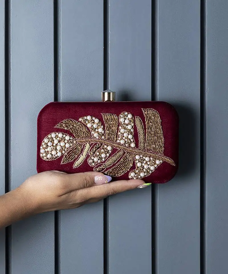 Red velvet hand embroidered leaf clutch