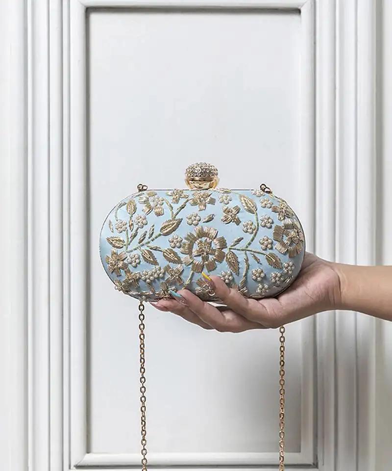 Blue silk hand embroidered clutch with floral design