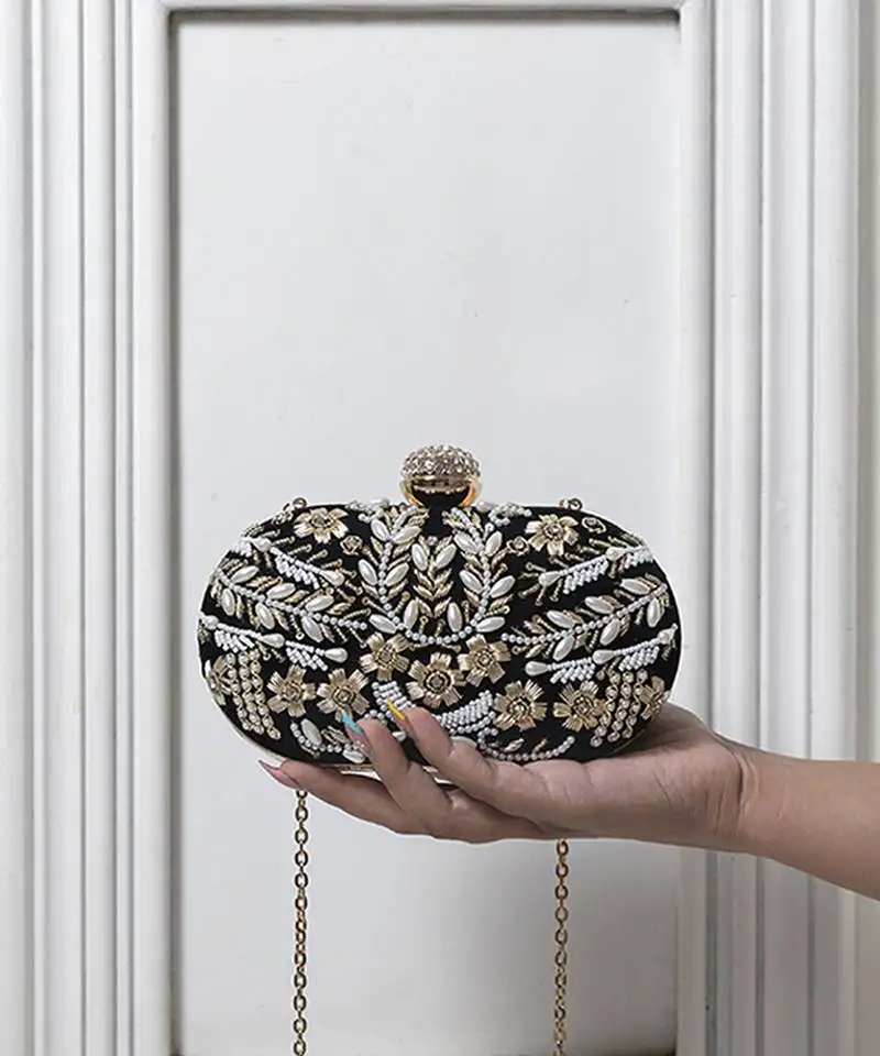 Black silk zarozi hand embroidered clutch