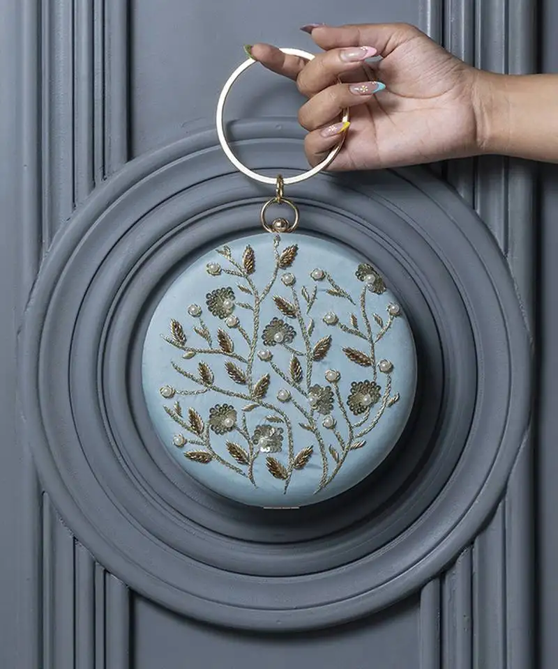 Hand embroidered silk blue clutch