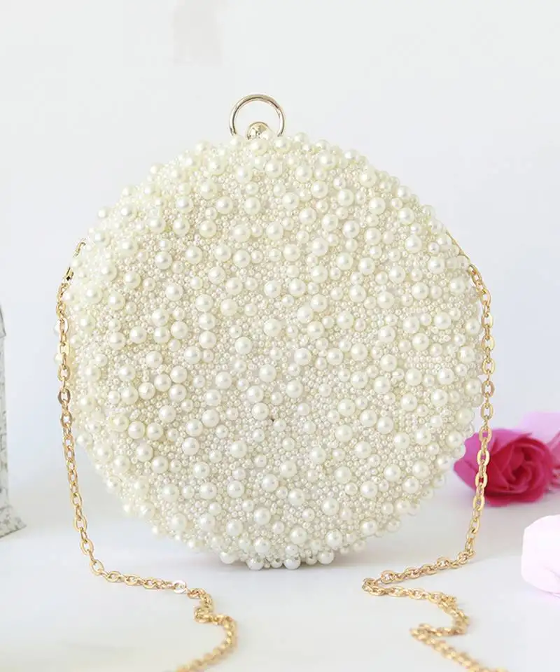 All white pearl hand embroidered clutch