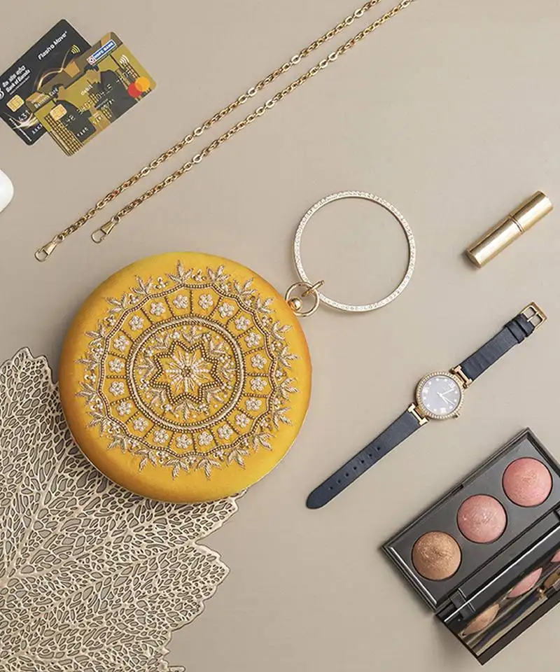 Yellow silk hand embroidered clutch