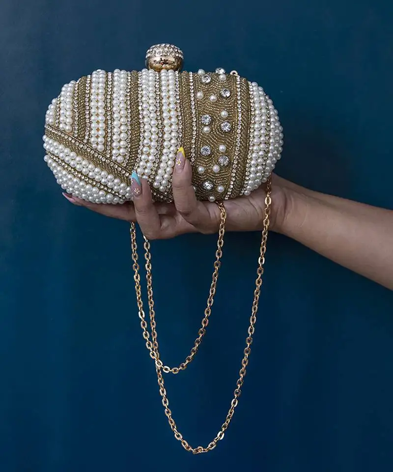 Hand embroidered gold silk clutch