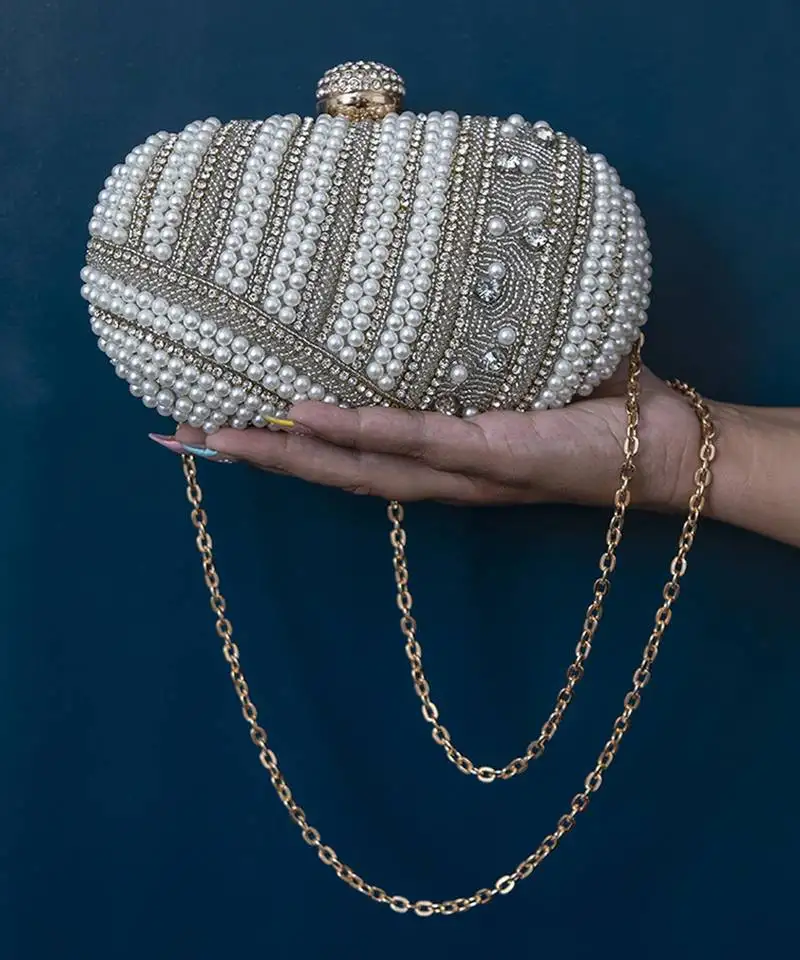 Silver hand embroidered silk clutch