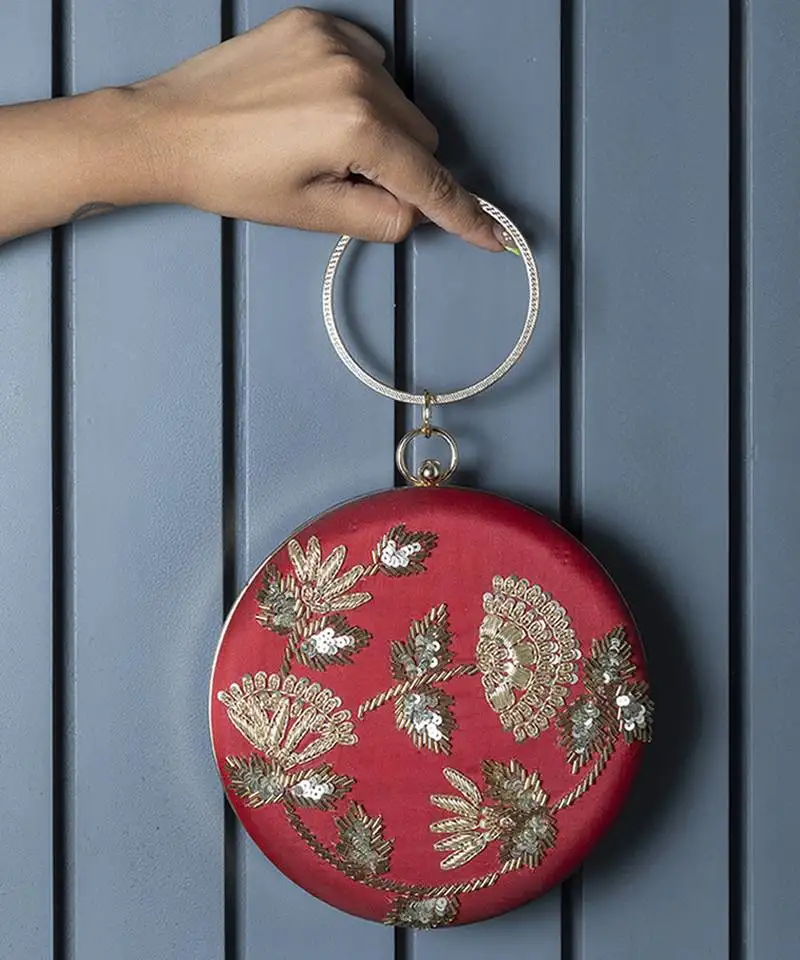 Hand embroidered red clutch