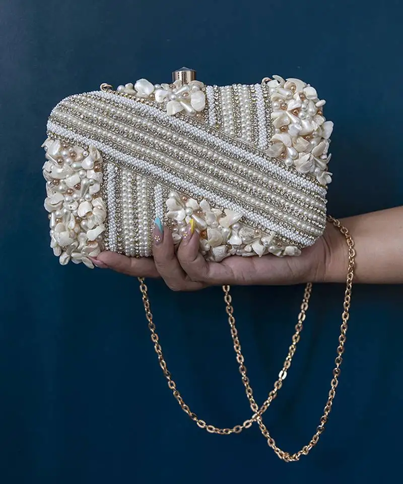 White silk hand embroidered clutch
