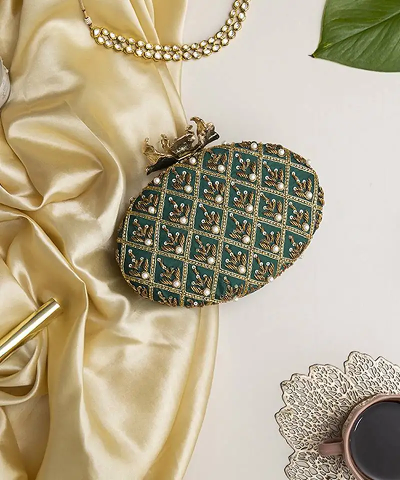 Green hand embroidered silk clutch