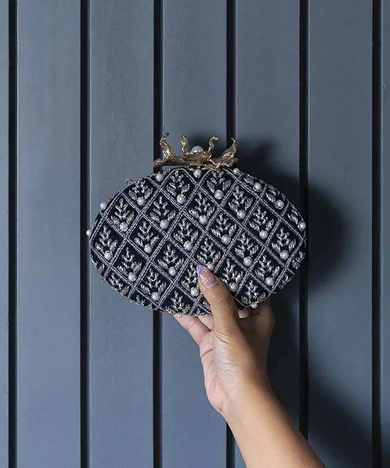 Blue silk hand embroidered clutch