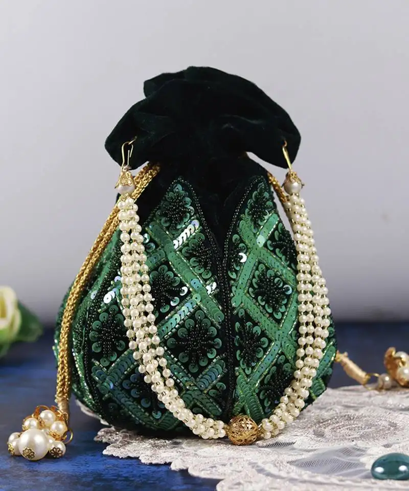 Green velvet hand embroidered lotus potli