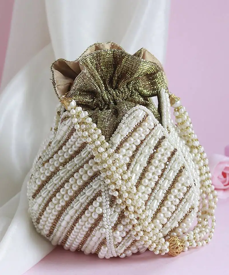 Gold hand embroidered silk mini potli