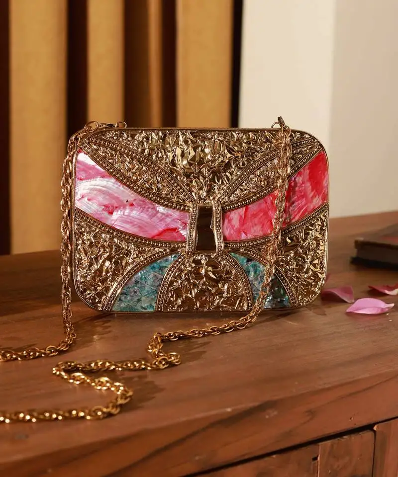 Handcrafted gold clutch with detachable chain