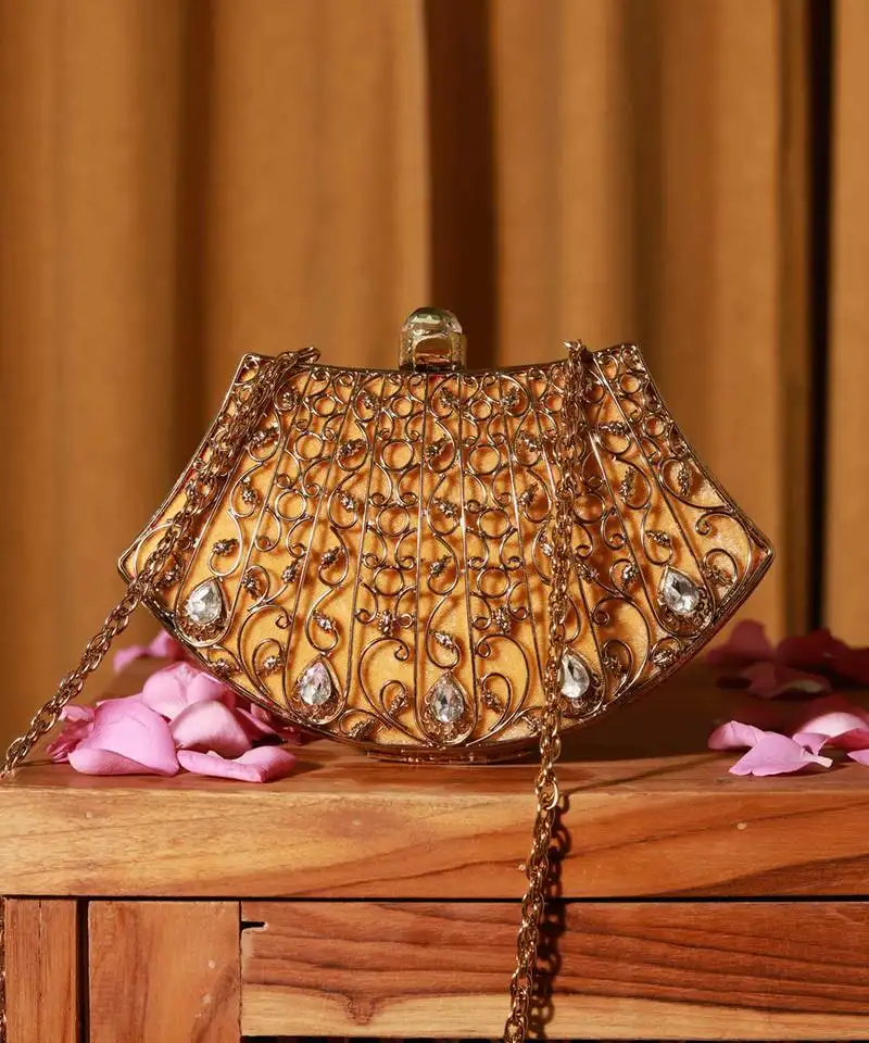 Gold embellished brass clutch