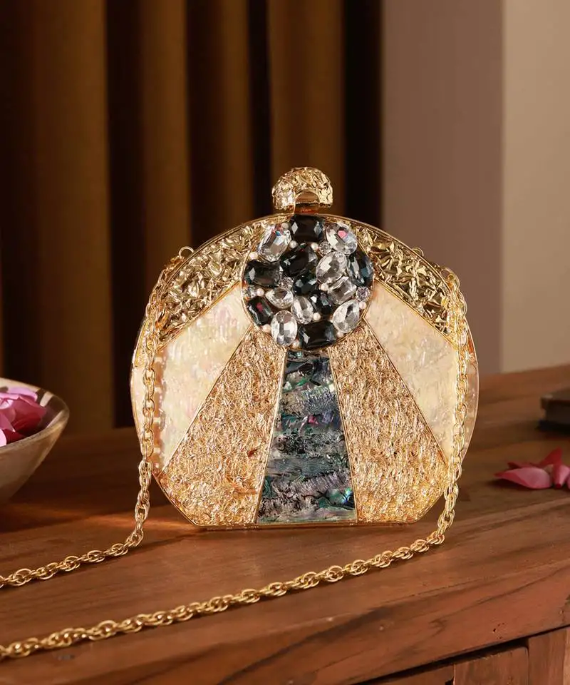 Gold round clutch with detachable chain