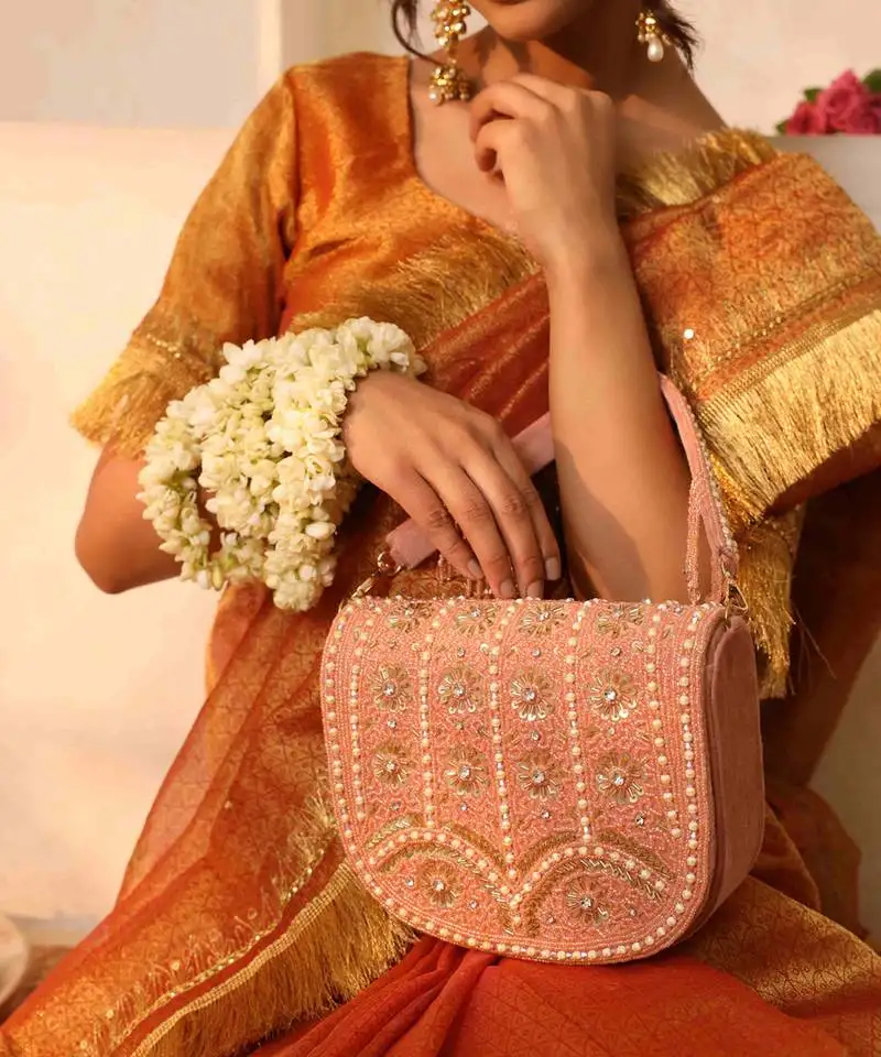 Pink suede bag with handle