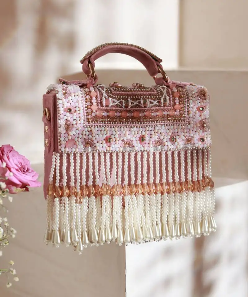 Suede pink flap over bag with handle