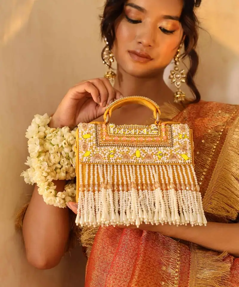 Yellow suede yellow flap over bag with handle