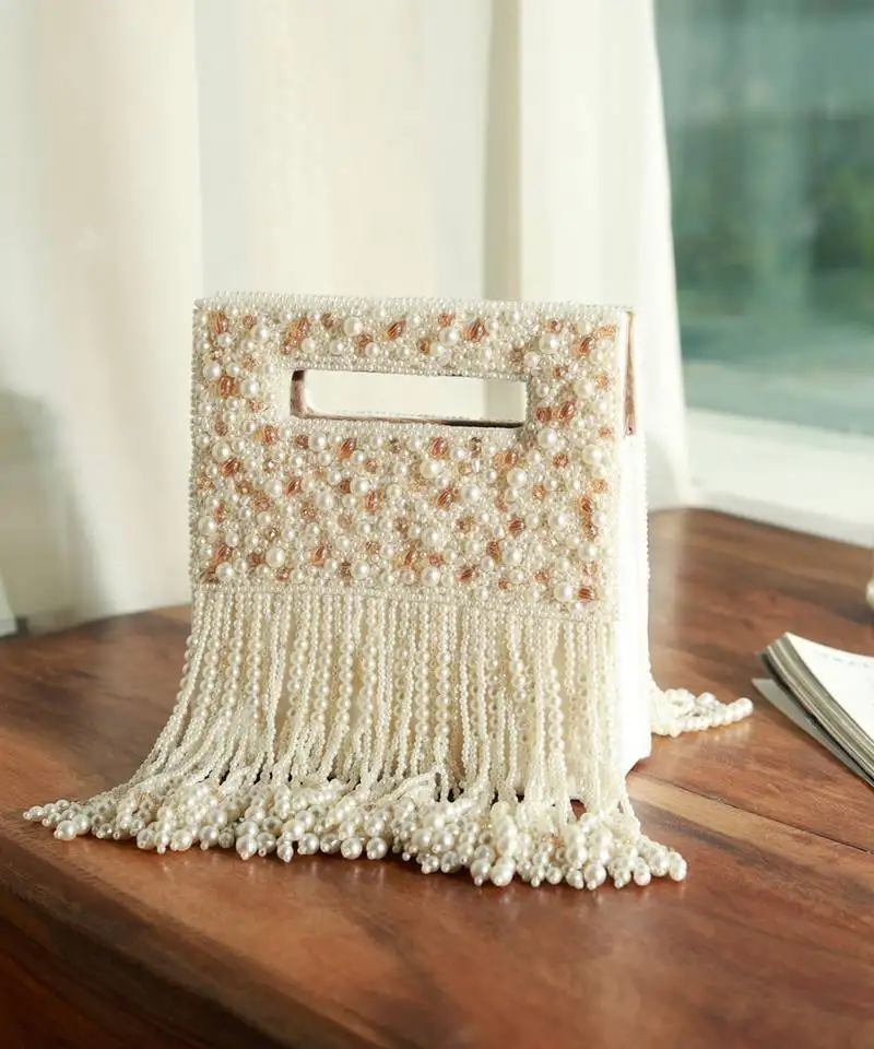 White suede embellished flap over clutch bag