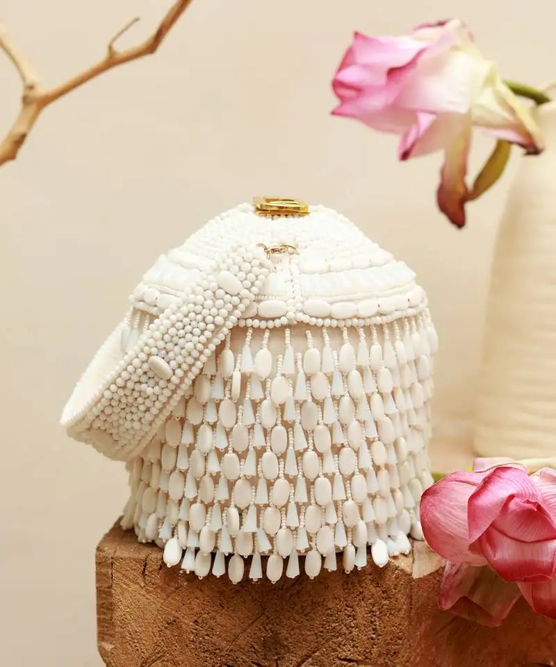 White suede round embellished bag with handle