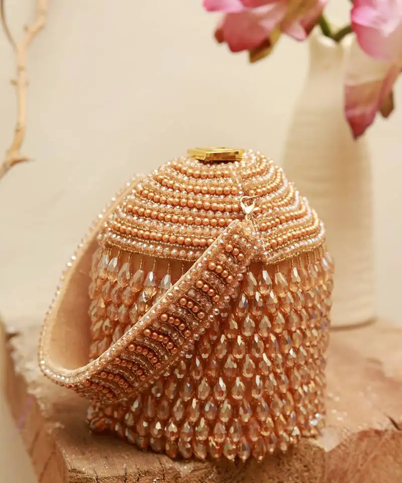 Gold suede round embellished bag with handle