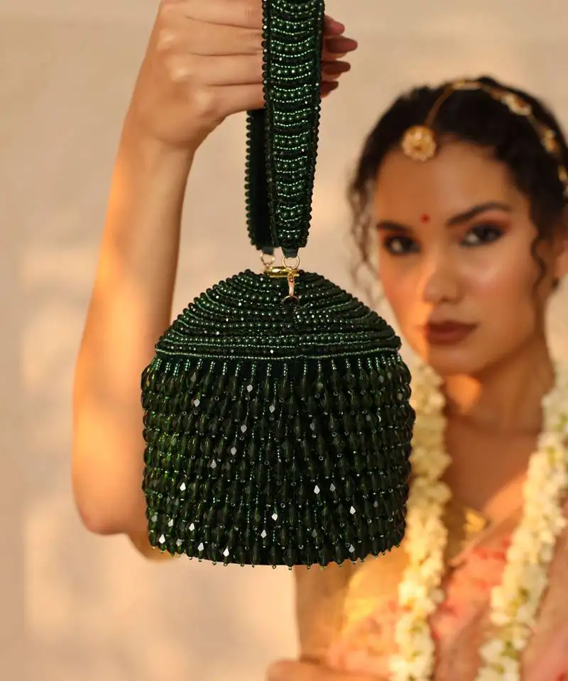 Green suede round embellished bag with handle