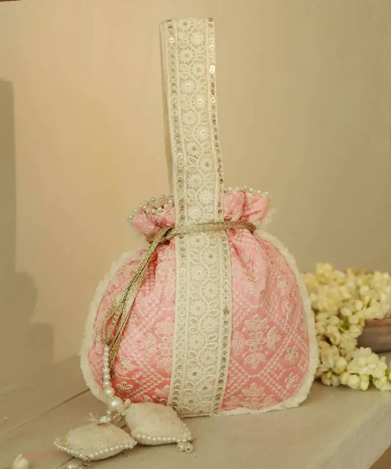 Pink silk potli bag with handle