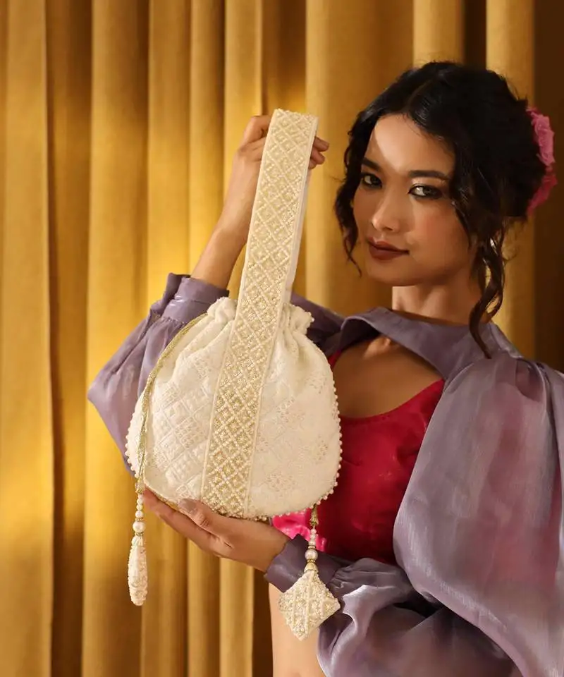 White silk taj embroidered potli bag with handle