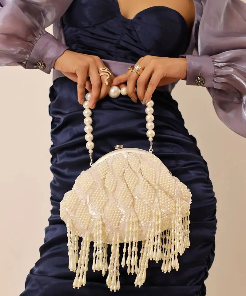 White suede pearl with detachable handle