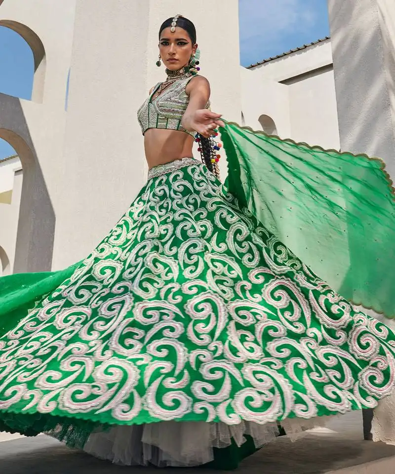 Green silk embroidered lehenga with dupatta