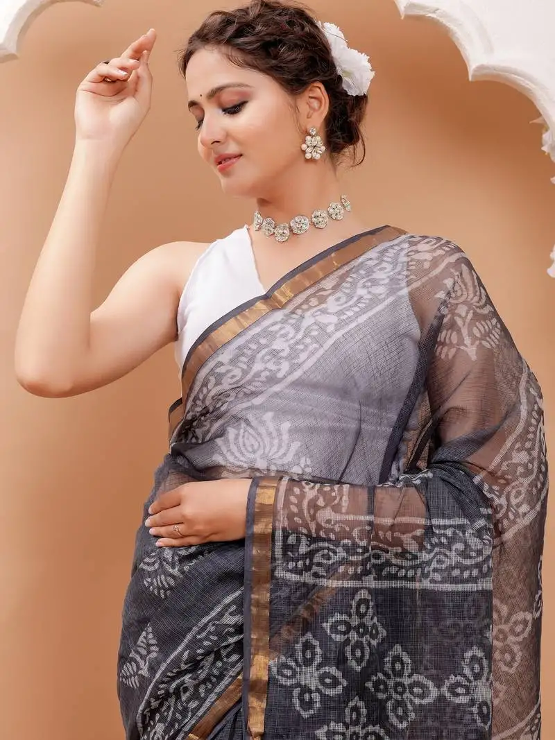 Black batik print kota doria saree with blouse piece