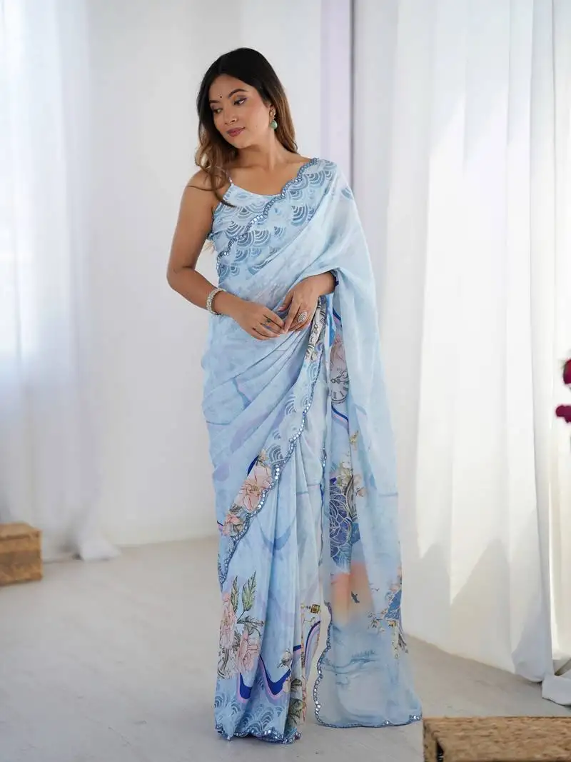 Sky blue printed chinon saree with border