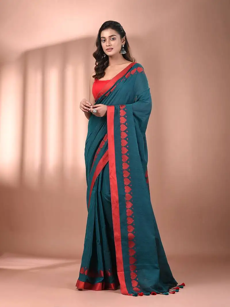Teal cotton soft saree with woven heart borders
