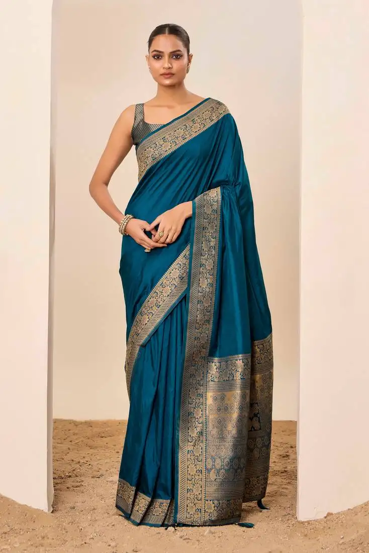 Teal blue dola silk blend woven saree