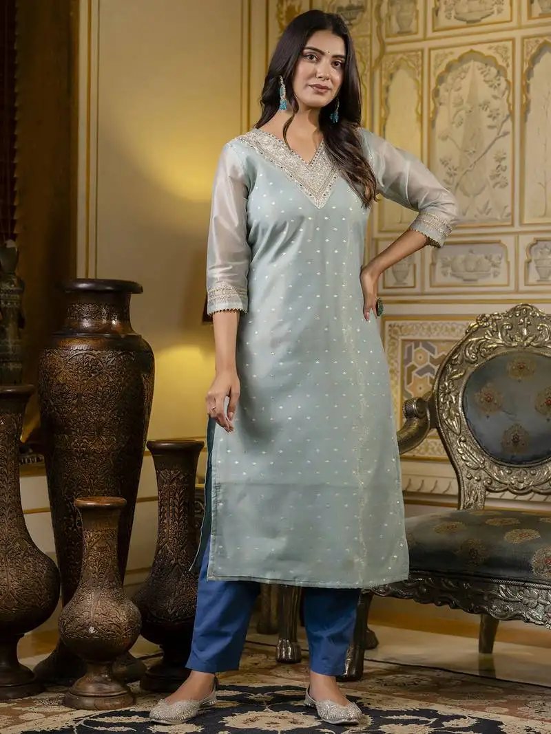 Green embroidered shimmer silk salwar suit